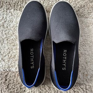 Rothy's women’s Black Slip-On Loafers with Blue Trim